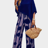 Terēzes ikdienas komplekts no viegla auduma ar apdrukātu blūzi un plūstošām biksēm