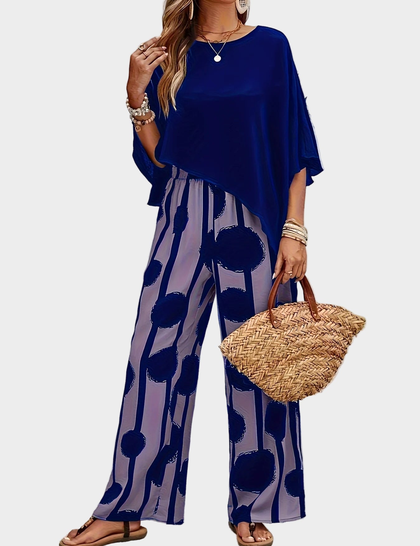 Terēzes ikdienas komplekts no viegla auduma ar apdrukātu blūzi un plūstošām biksēm