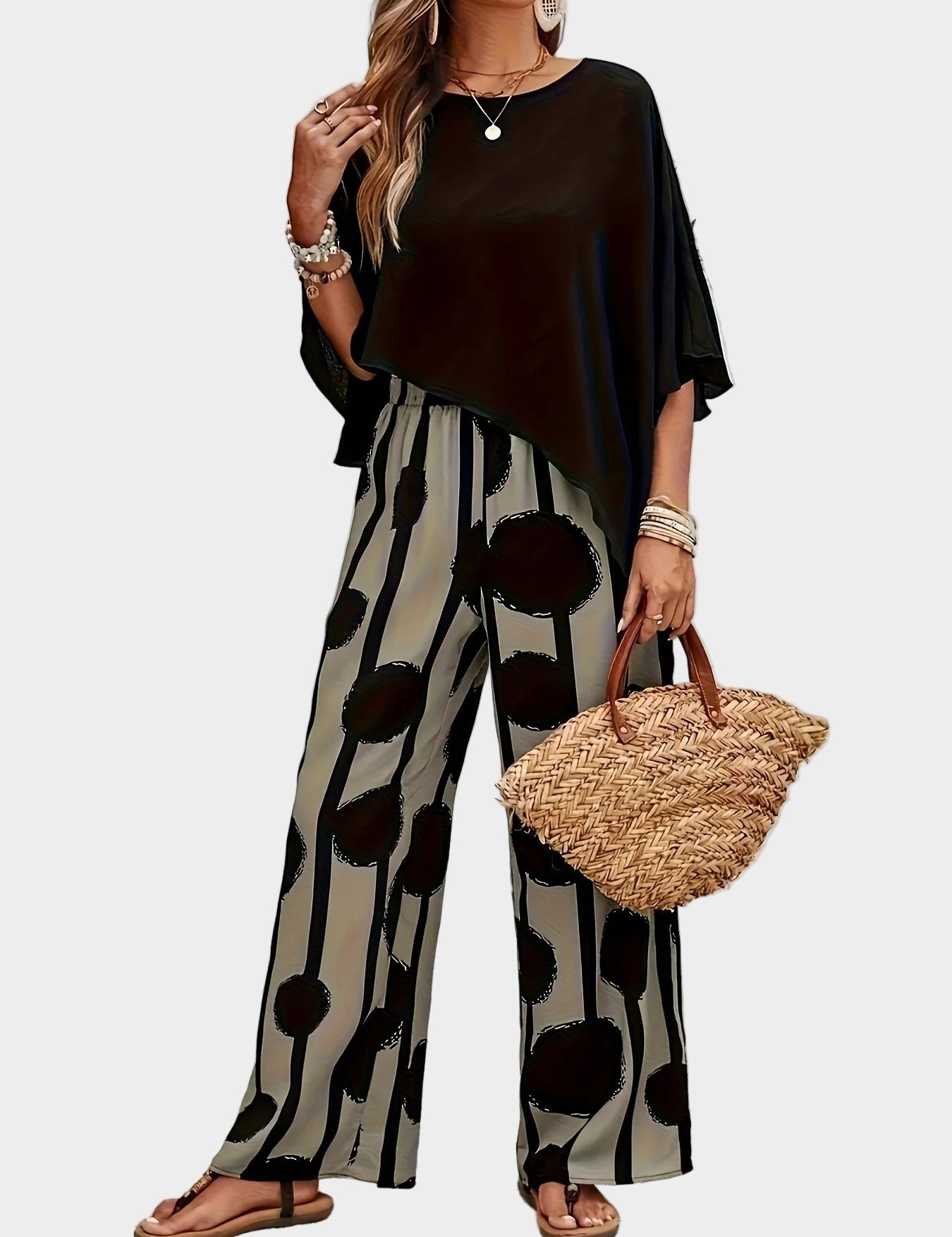 Terēzes ikdienas komplekts no viegla auduma ar apdrukātu blūzi un plūstošām biksēm