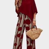 Terēzes ikdienas komplekts no viegla auduma ar apdrukātu blūzi un plūstošām biksēm